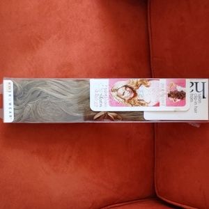 Clip in hair extensions. Color: honey ginger.